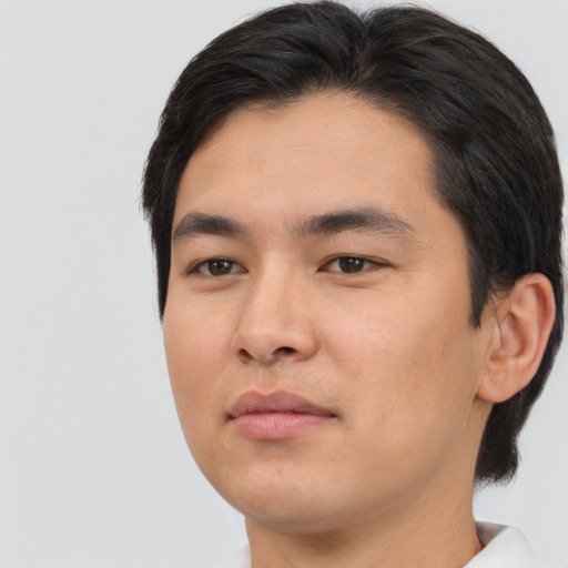 Neutral asian young-adult male with medium  brown hair and brown eyes
