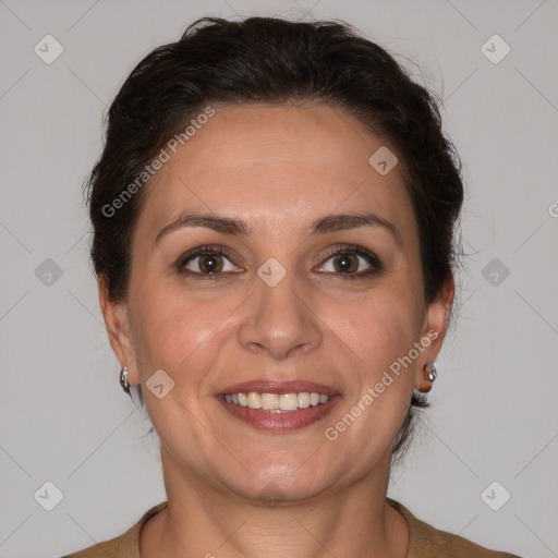 Joyful white adult female with short  brown hair and brown eyes