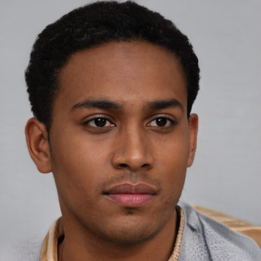 Neutral latino young-adult male with short  brown hair and brown eyes