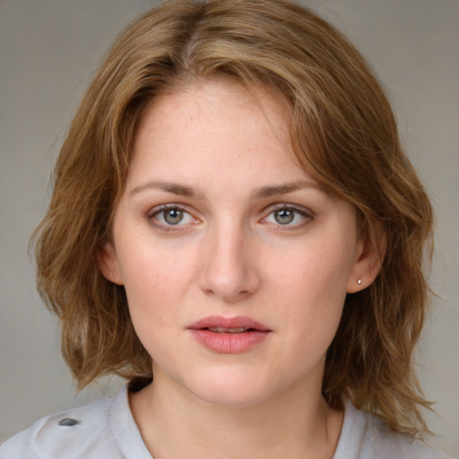 Neutral white young-adult female with medium  brown hair and blue eyes