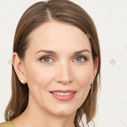 Joyful white young-adult female with medium  brown hair and grey eyes