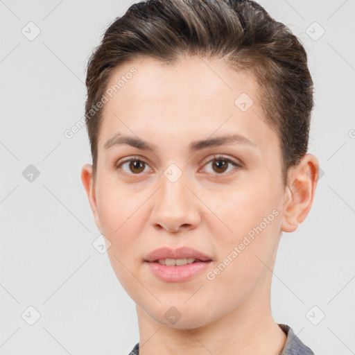 Joyful white young-adult female with short  brown hair and brown eyes