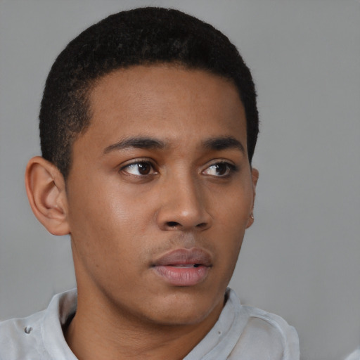 Neutral black young-adult male with short  brown hair and brown eyes