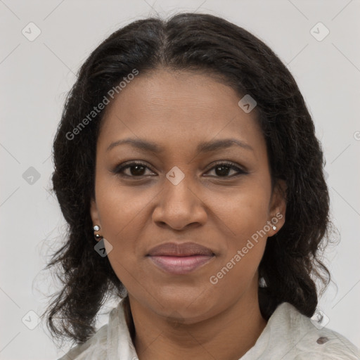 Joyful black young-adult female with medium  brown hair and brown eyes