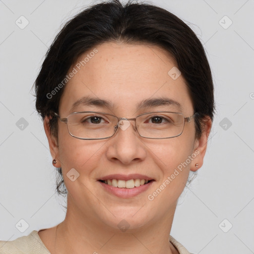 Joyful white adult female with medium  brown hair and brown eyes