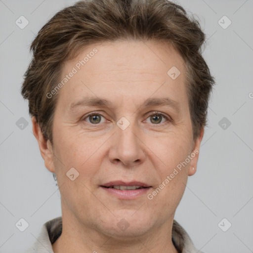 Joyful white adult female with short  brown hair and brown eyes