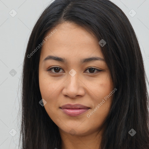 Joyful latino young-adult female with long  brown hair and brown eyes