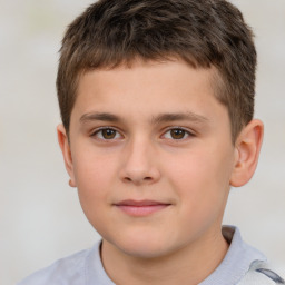 Joyful white child male with short  brown hair and brown eyes