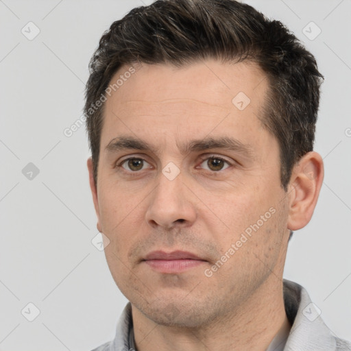 Neutral white adult male with short  brown hair and brown eyes