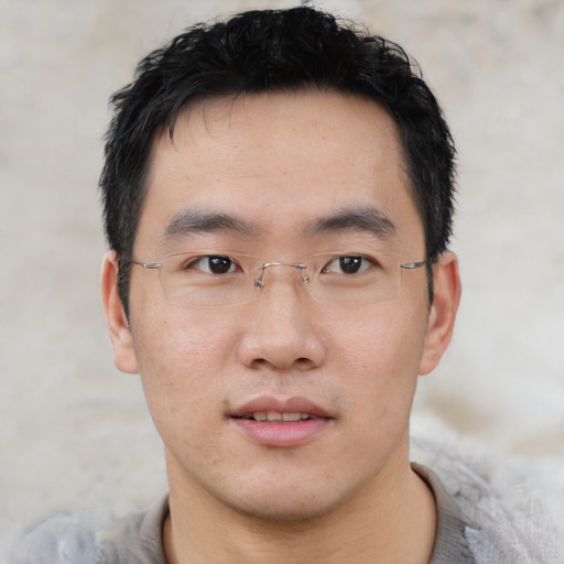 Neutral asian young-adult male with short  black hair and brown eyes