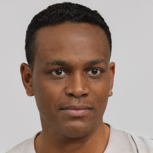 Neutral black young-adult male with short  black hair and brown eyes
