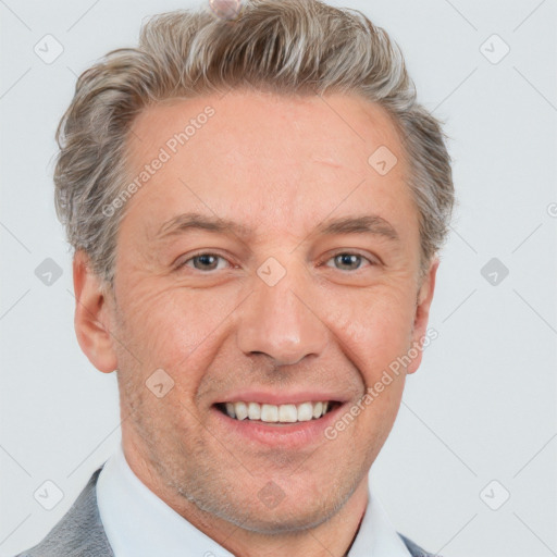 Joyful white adult male with short  brown hair and grey eyes