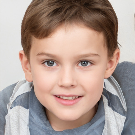 Joyful white child male with short  brown hair and brown eyes