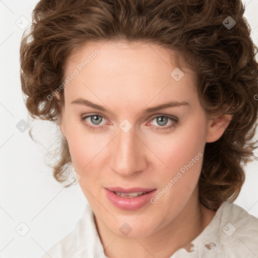 Joyful white young-adult female with medium  brown hair and green eyes