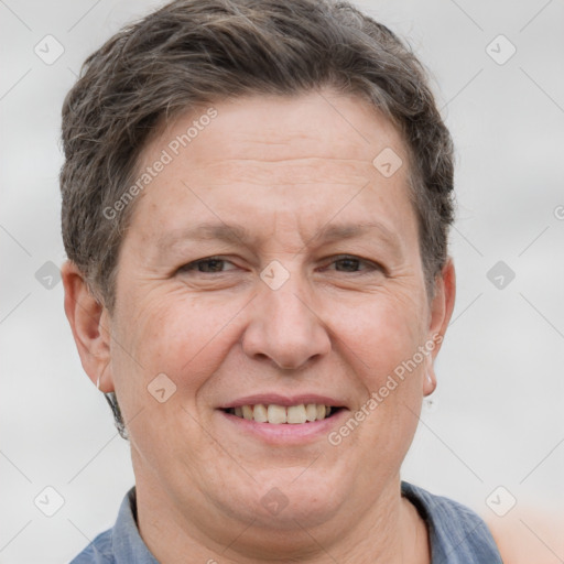 Joyful white adult female with short  brown hair and brown eyes