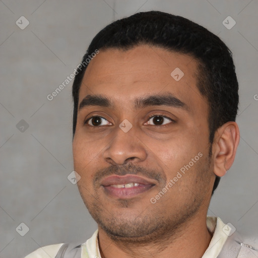 Joyful latino young-adult male with short  black hair and brown eyes