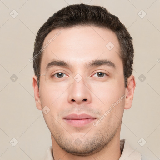 Neutral white young-adult male with short  brown hair and brown eyes