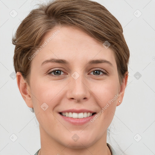 Joyful white young-adult female with short  brown hair and grey eyes