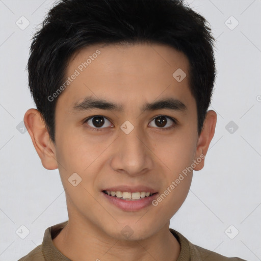 Joyful latino young-adult male with short  brown hair and brown eyes