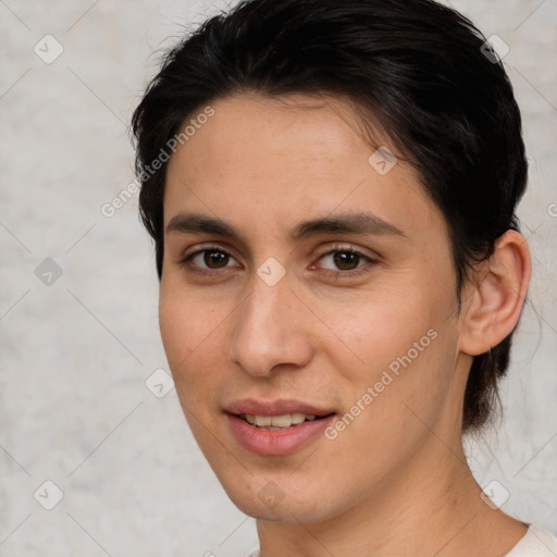 Joyful white young-adult female with short  brown hair and brown eyes