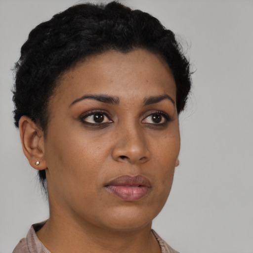Neutral black young-adult female with short  brown hair and brown eyes