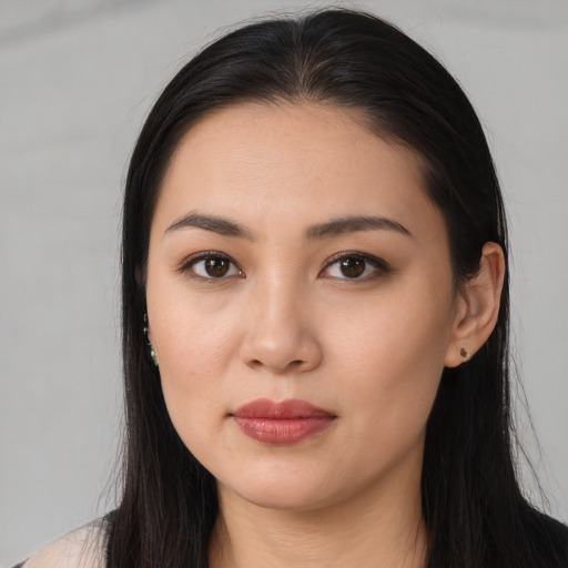 Neutral asian young-adult female with long  brown hair and brown eyes