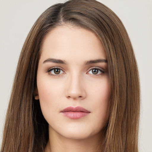 Neutral white young-adult female with long  brown hair and brown eyes