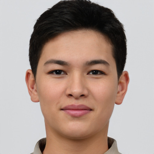 Joyful asian young-adult male with short  brown hair and brown eyes
