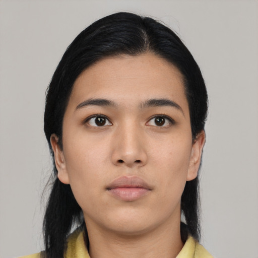 Neutral asian young-adult female with medium  black hair and brown eyes