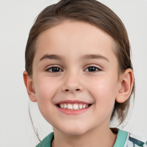 Joyful white child female with medium  brown hair and grey eyes