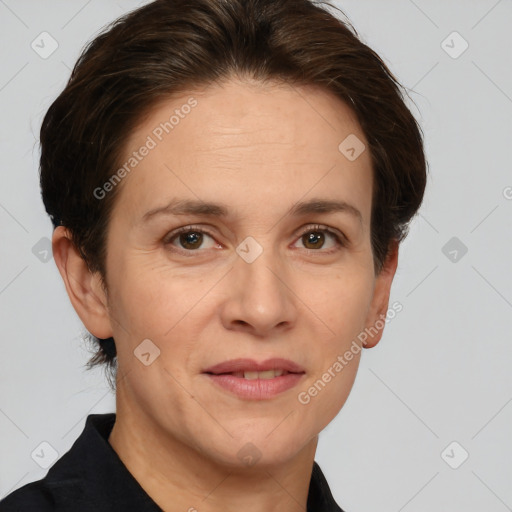 Joyful white adult female with short  brown hair and brown eyes