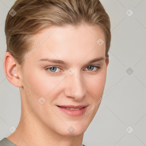 Joyful white young-adult female with short  brown hair and grey eyes