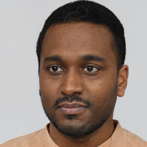 Neutral black young-adult male with short  black hair and brown eyes