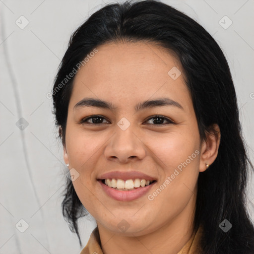 Joyful asian young-adult female with long  black hair and brown eyes