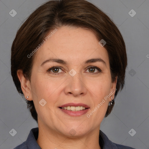 Joyful white adult female with medium  brown hair and grey eyes