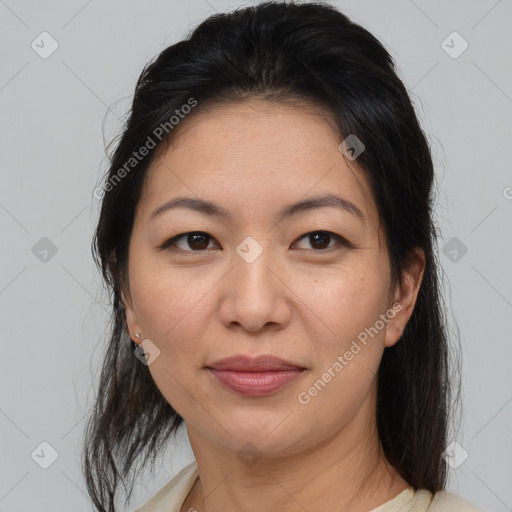 Joyful white adult female with medium  brown hair and brown eyes