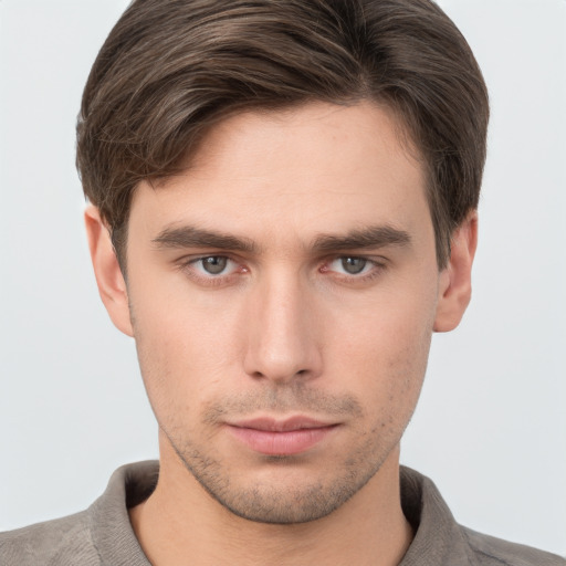 Neutral white young-adult male with short  brown hair and grey eyes