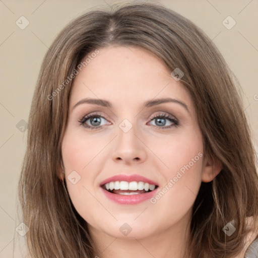 Joyful white young-adult female with long  brown hair and green eyes