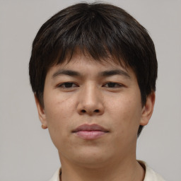 Neutral asian young-adult male with short  brown hair and brown eyes