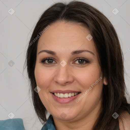 Joyful white adult female with medium  brown hair and brown eyes