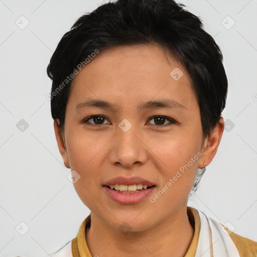 Joyful asian young-adult female with short  black hair and brown eyes