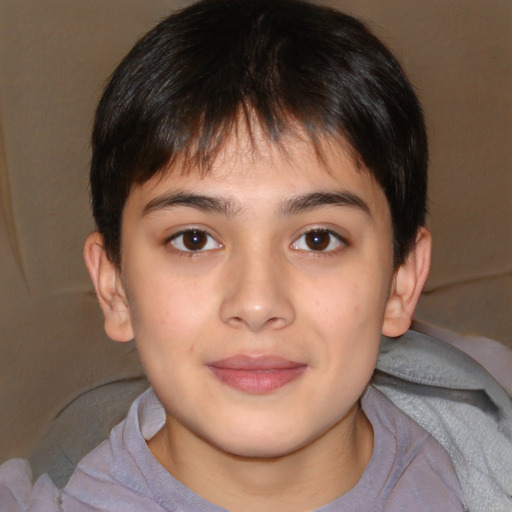 Joyful white child male with short  brown hair and brown eyes