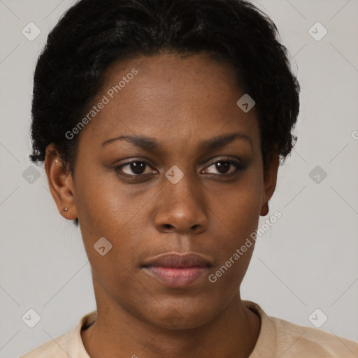 Neutral black young-adult female with short  brown hair and brown eyes