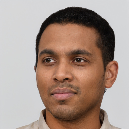 Neutral black young-adult male with short  black hair and brown eyes