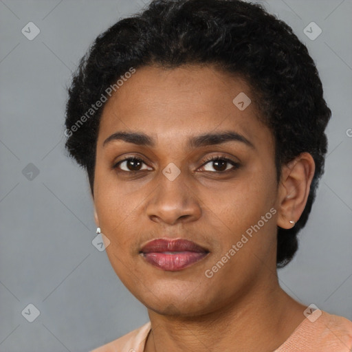 Joyful latino young-adult female with short  black hair and brown eyes