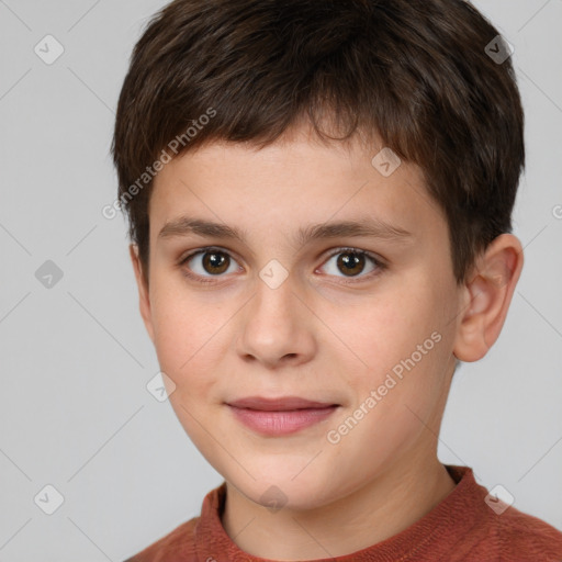 Joyful white child male with short  brown hair and brown eyes