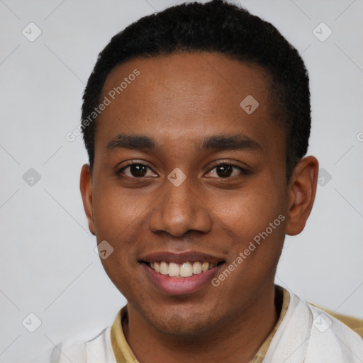 Joyful black young-adult male with short  brown hair and brown eyes