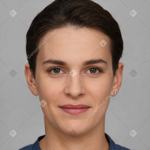 Joyful white young-adult female with short  brown hair and grey eyes