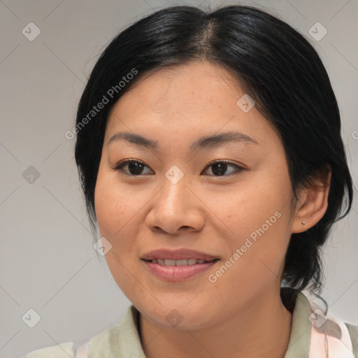 Joyful asian young-adult female with medium  brown hair and brown eyes