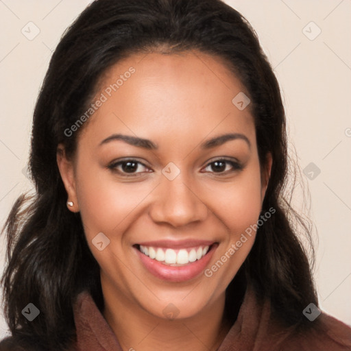 Joyful latino young-adult female with long  brown hair and brown eyes